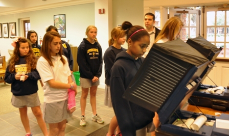 students voting in private election